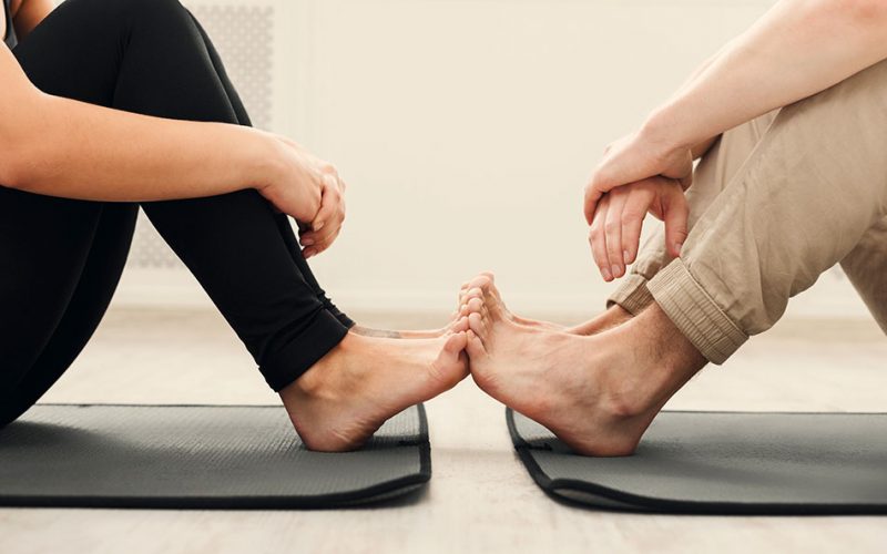 couples yoga feet